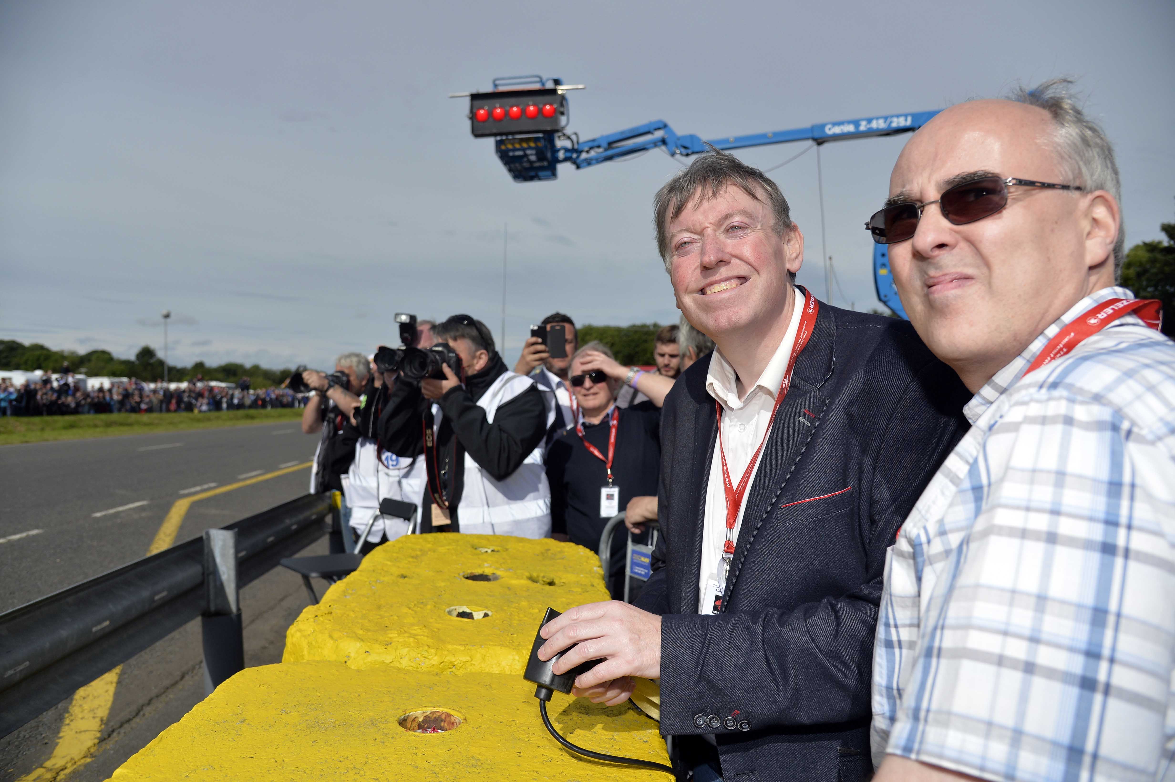 The Chairman of the Leisure and Community Development Committee, Alderman Paul Porter starts the second wave of the Superstock race.