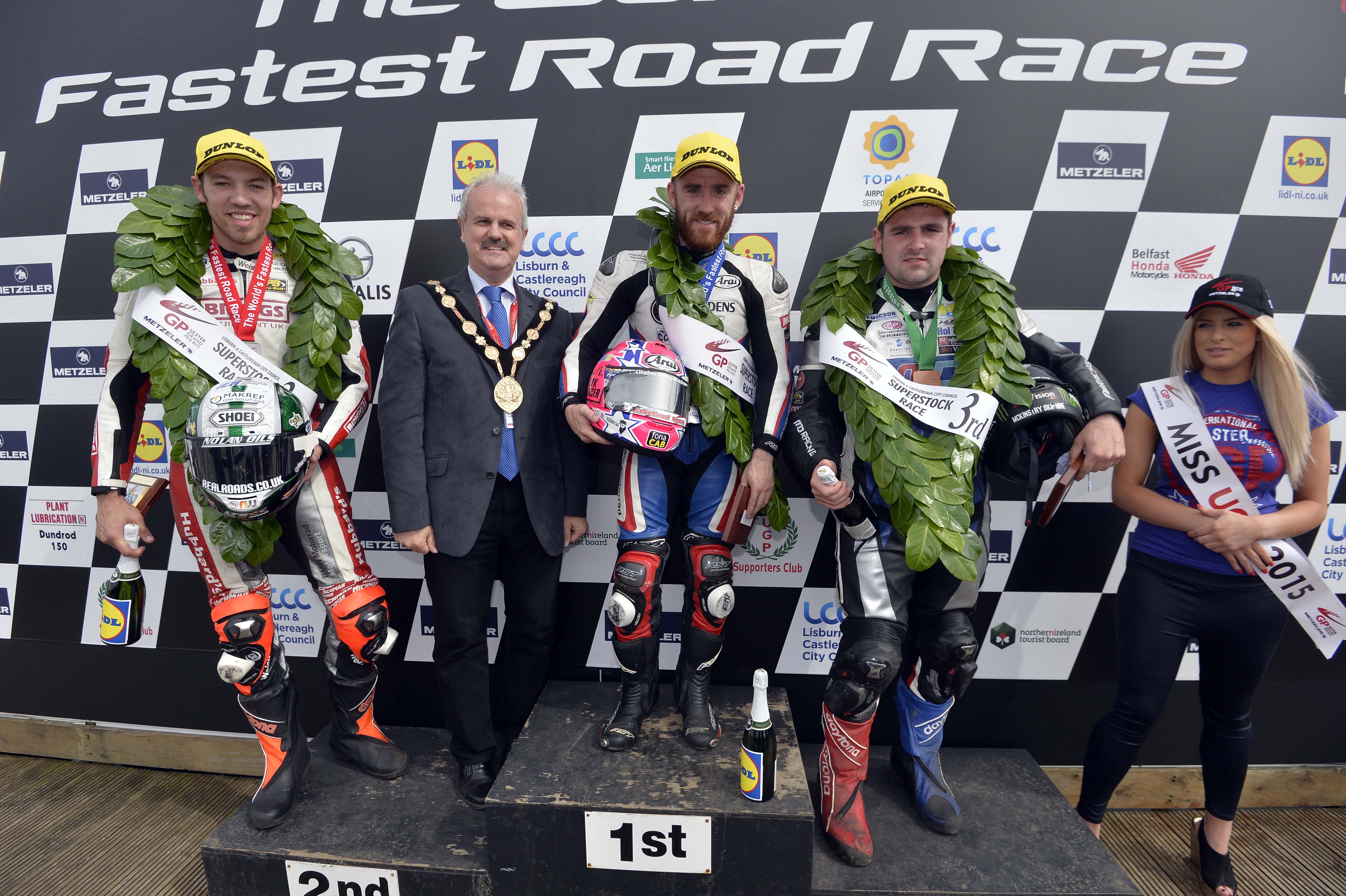 The Mayor of Lisburn & Castlereagh City Council, Councillor Thomas Beckett pictured on the podium with 1st place Lee Johnston, 2nd place Peter Hickman and 3rd place Michael Dunlop  